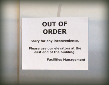 Elevator with Service Disruption sign.